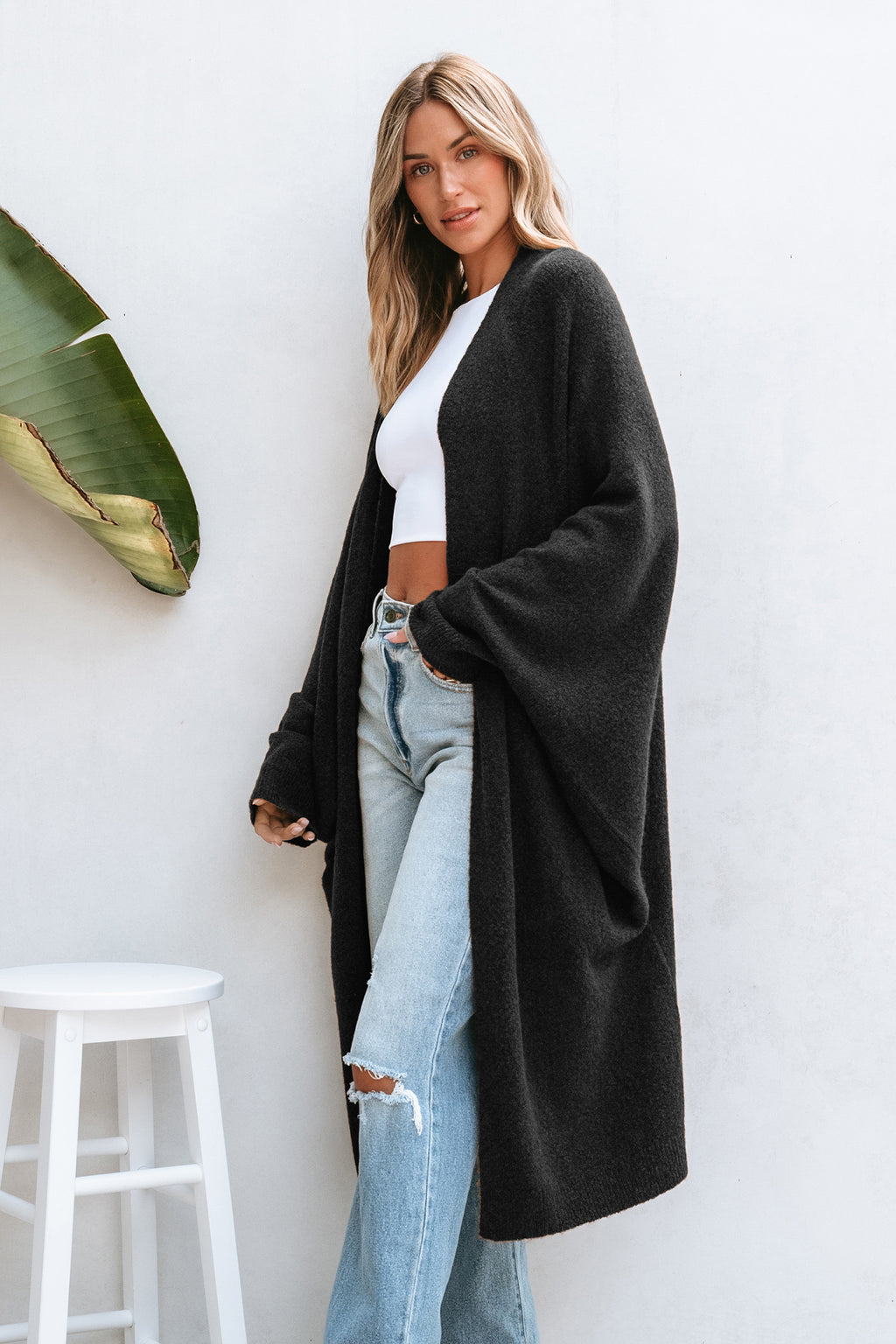 Schwarze Strickjacke mit offenen Dolman-Ärmeln
