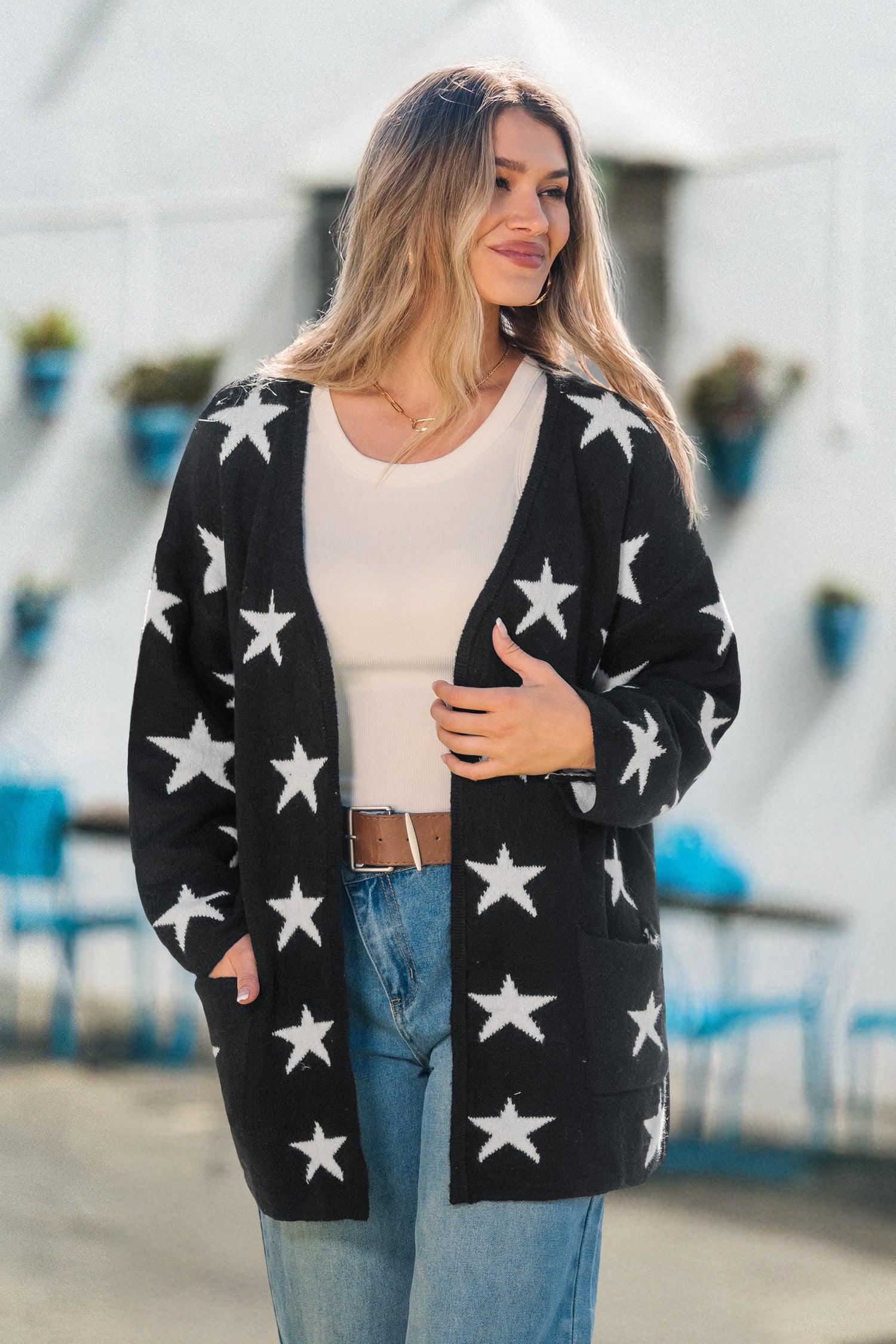 Schwarze Strickjacke mit Sternenprint