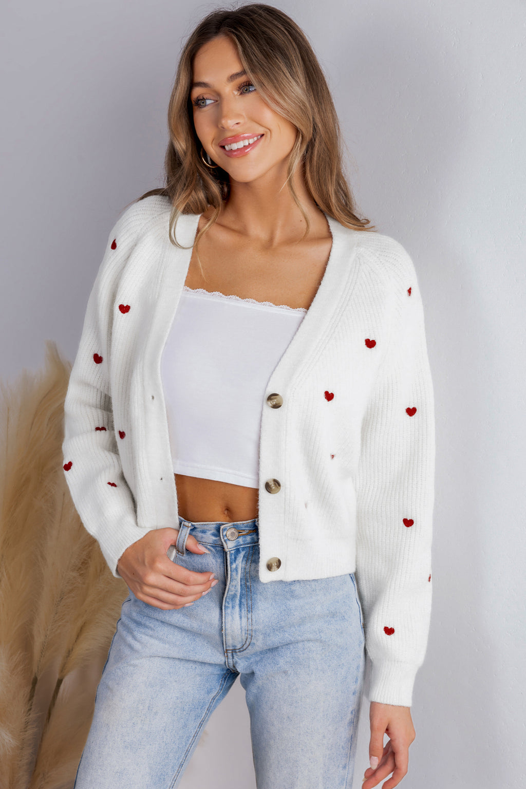 Strickjacke mit V-Ausschnitt und Herzmuster