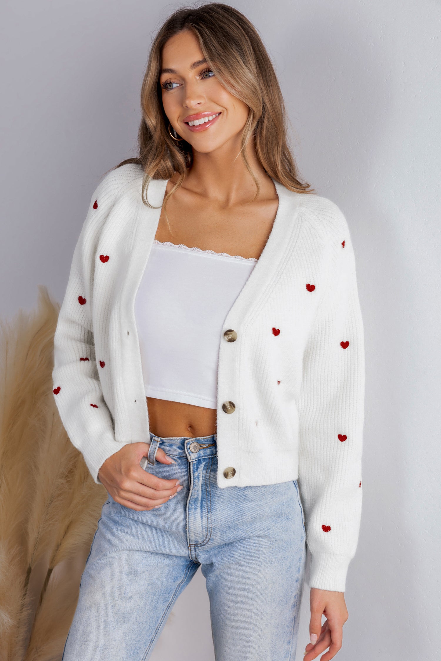 Strickjacke mit V-Ausschnitt und Herzmuster