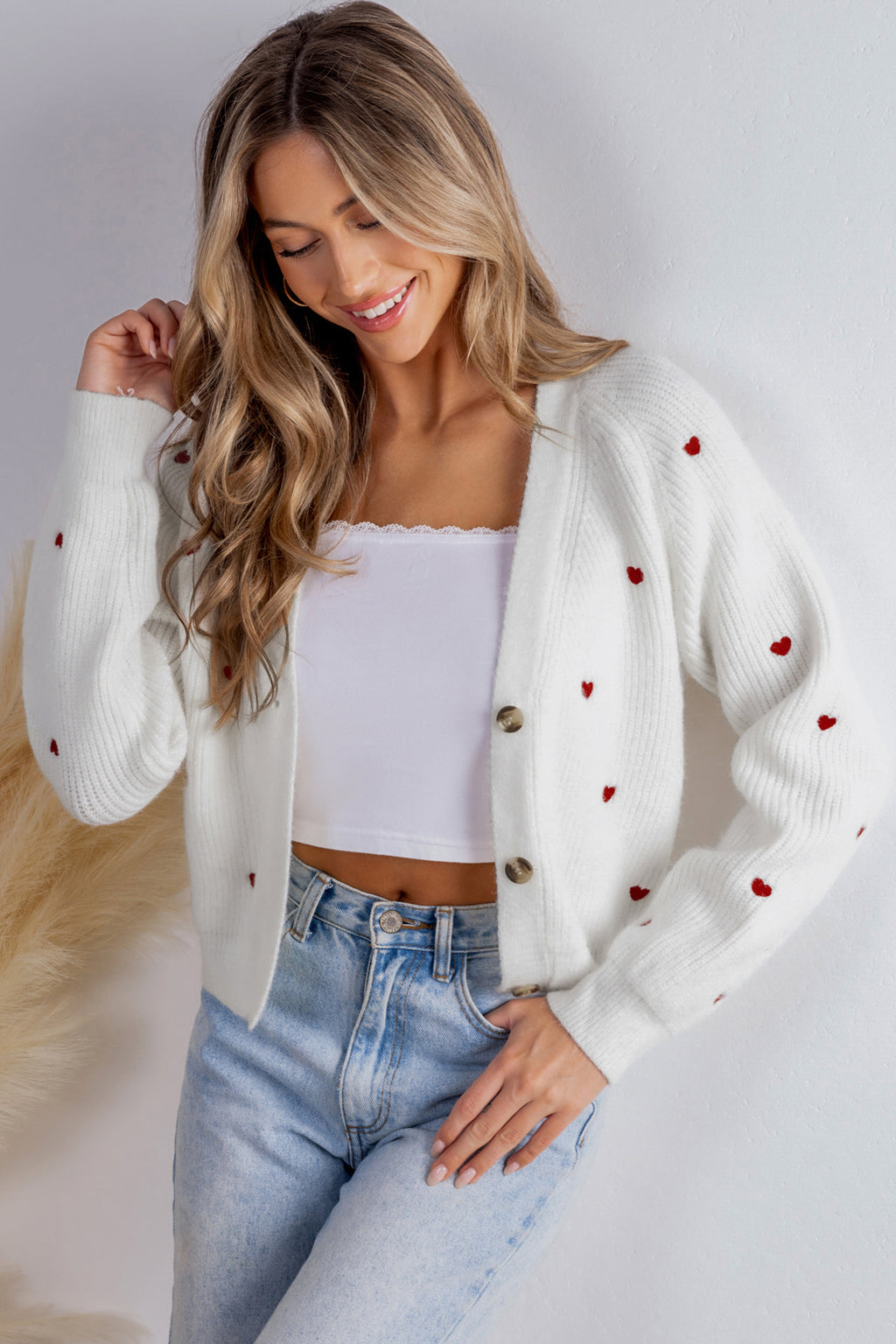 Strickjacke mit V-Ausschnitt und Herzmuster
