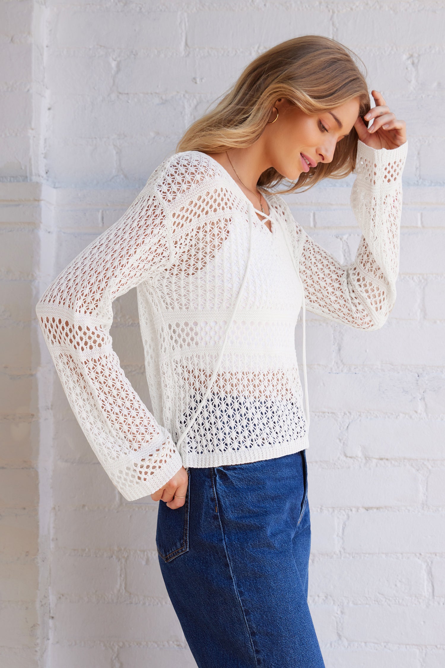 Elfenbeinfarbenes Pullover-Top mit V-Ausschnitt
