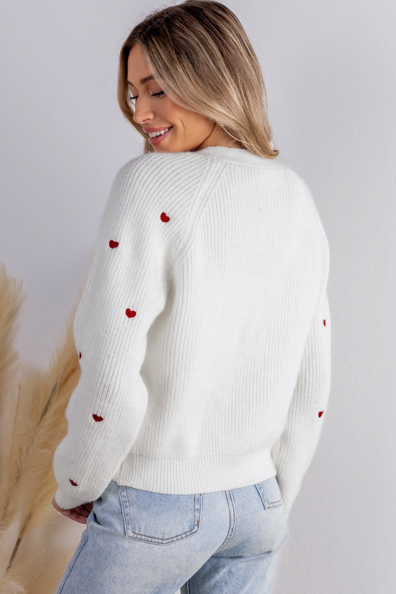 Strickjacke mit V-Ausschnitt und Herzmuster